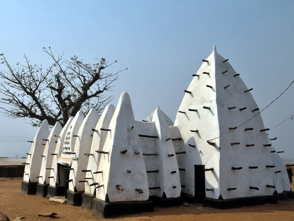 <a href="https://en.wikipedia.org/wiki/File:Larabanga_Mosque_Ghana.jpg"> "Larabanga Mosque Ghana" </a>  by <a href="https://commons.wikimedia.org/wiki/User:Sathyan.velumani"> Sathyan Velumani </a>  licensed under <a href="https://creativecommons.org/licenses/by-sa/3.0/deed.en"> Creative Commons Attribution-Share Alike 3.0 Unported</a>